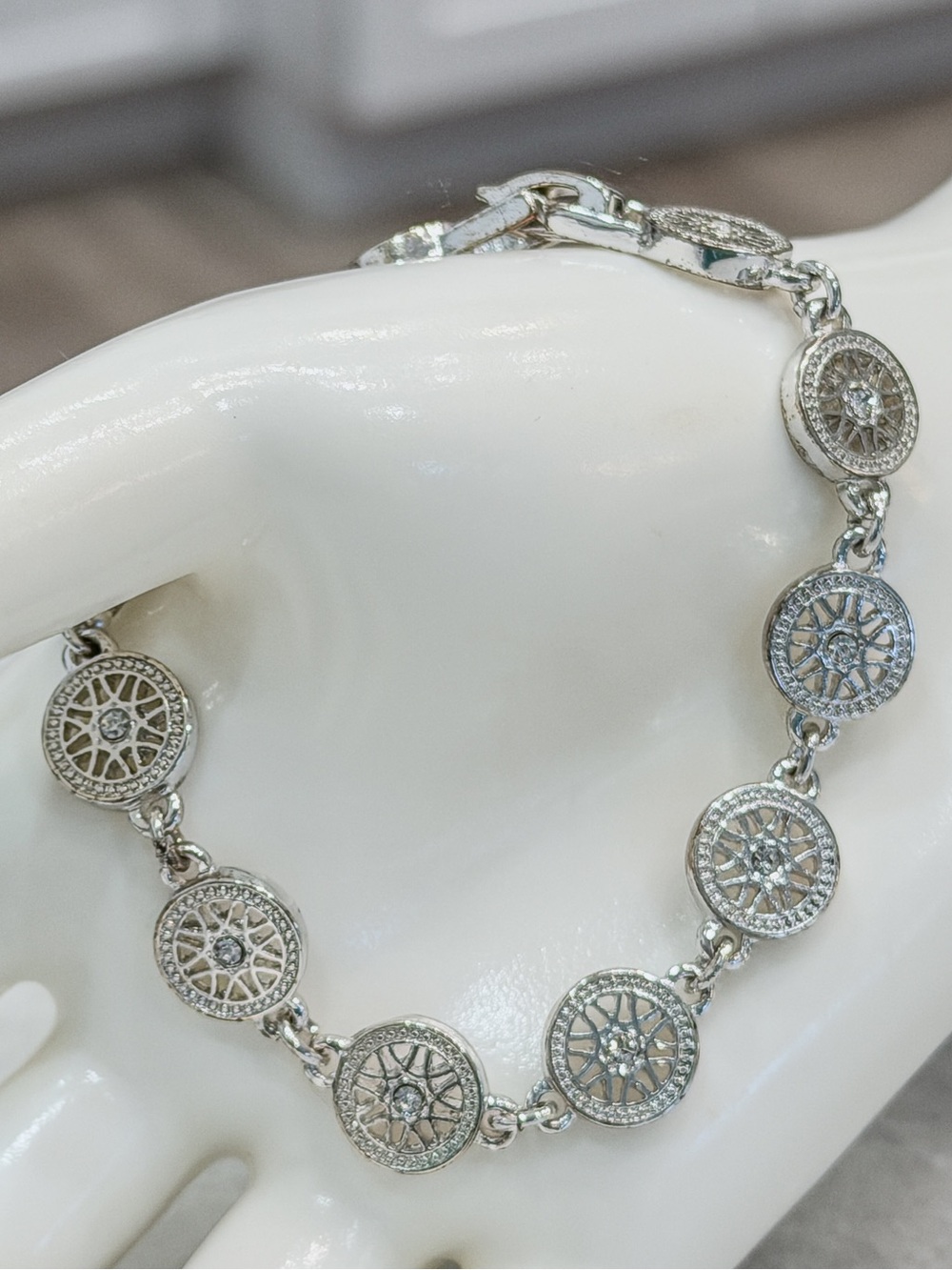 Vintage NAPIER Silver Sunburst Wheel Rhinestone Accented Bracelet